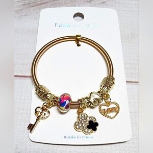 New Gold Sliding Charm Spring Bracelet